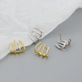 Radiant Grasp ✦ Fourfold Arc Stud Earrings